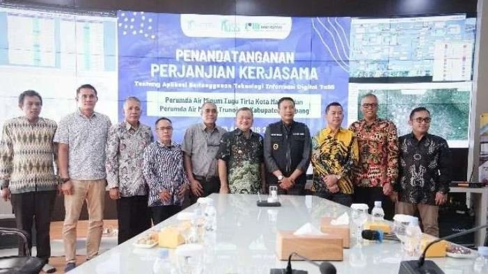 Klik untuk memperbesar gambar Penanda Tanganan Perjanjian Kerjasama Perumda Air Minum Trunoyo Sampang Dengan Tugu Tirta Kota Malang Tentang Teknologi Berlangganan Aplikasi ToSS